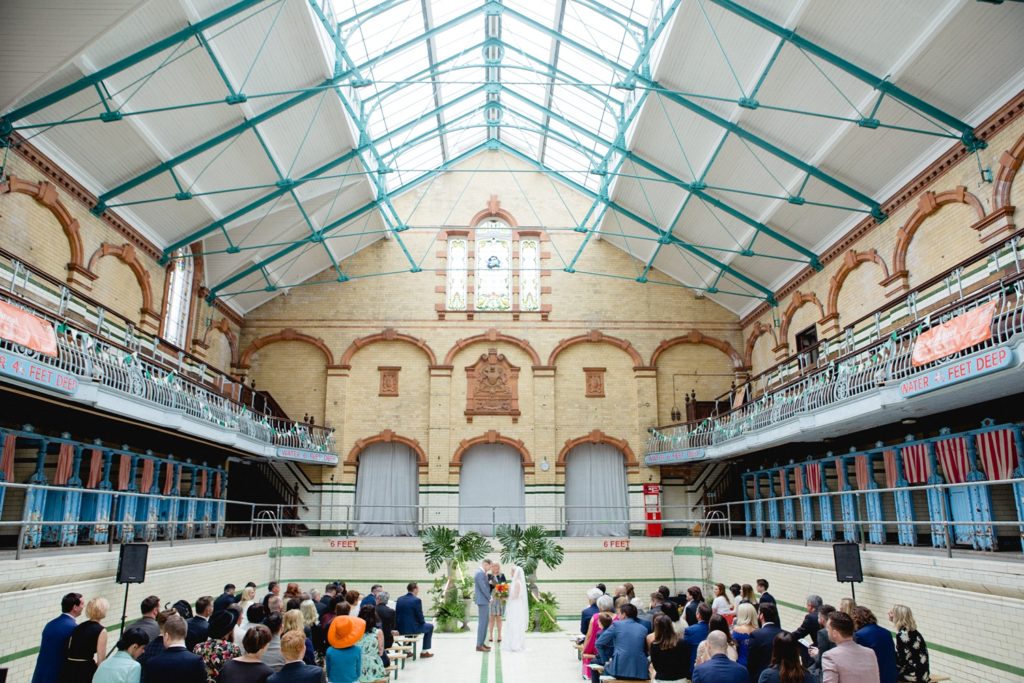 Bride and Groom in swimming baths wedding venue manchester