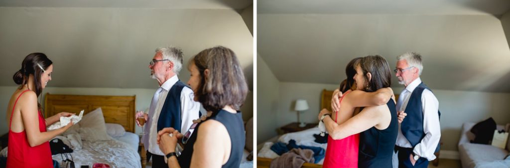 natural moment before wedding of bride with parents