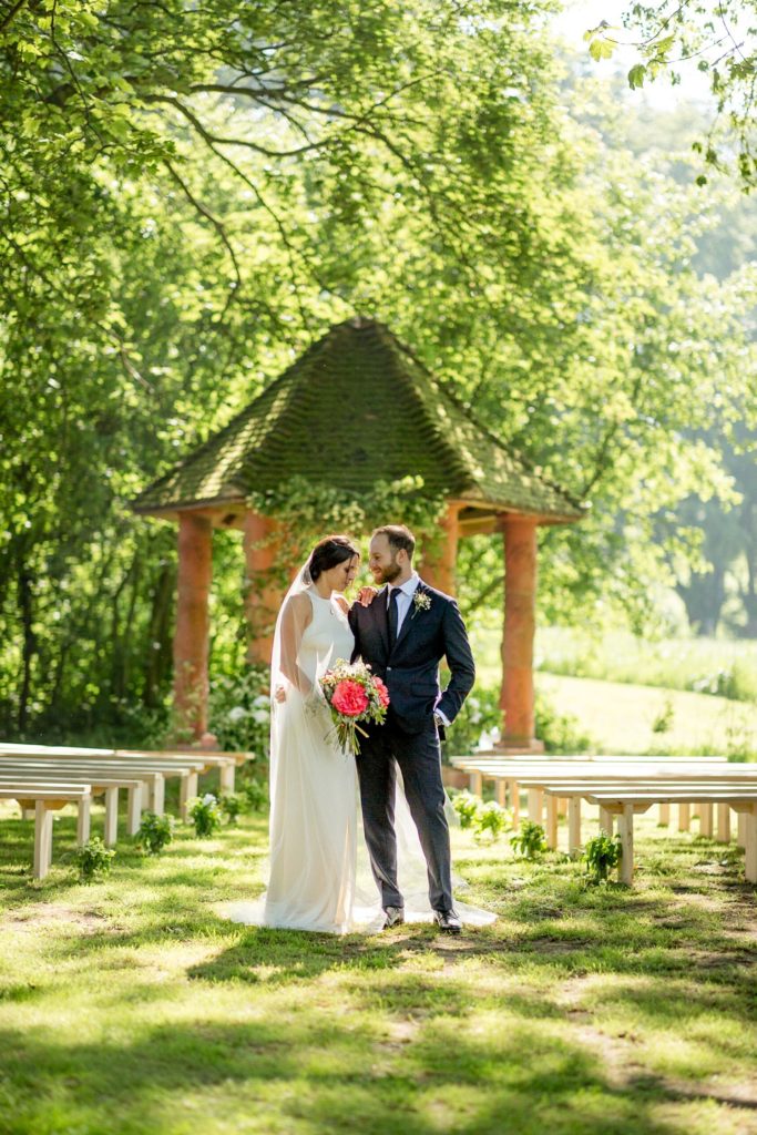 Modern and beautiful portrait of couple at their outdoor garden wedding kent