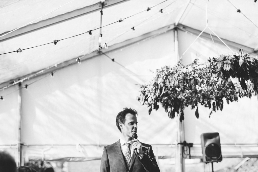 black and white photo of speeches in outdoor wedding celebrations